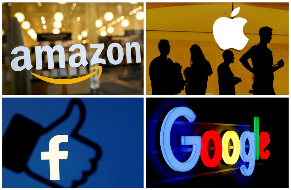 The logos of Amazon, Apple, Facebook and Google in a combination photo/File Photo
